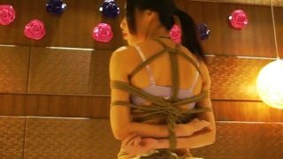 Asian Chinese bondage in bed handcuff