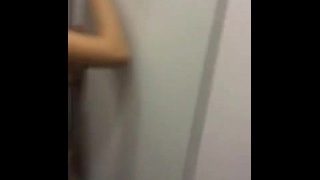 Asian couple having sex in dressing room