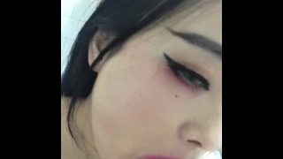 Sexy japanese cam girl sucking huge dick for the camera